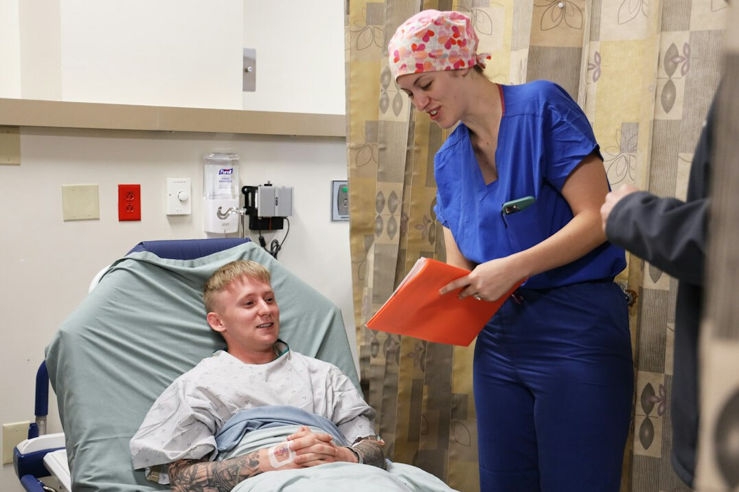 nurse helping patient