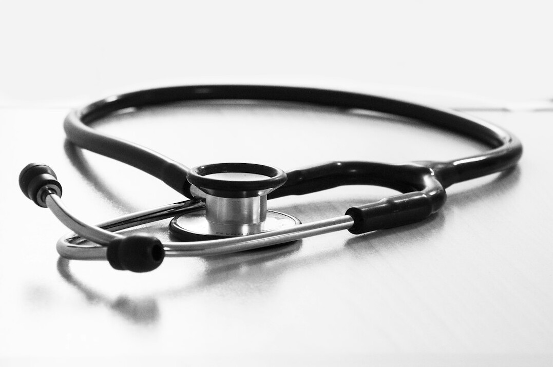 Stethoscope resting on a digital tablet